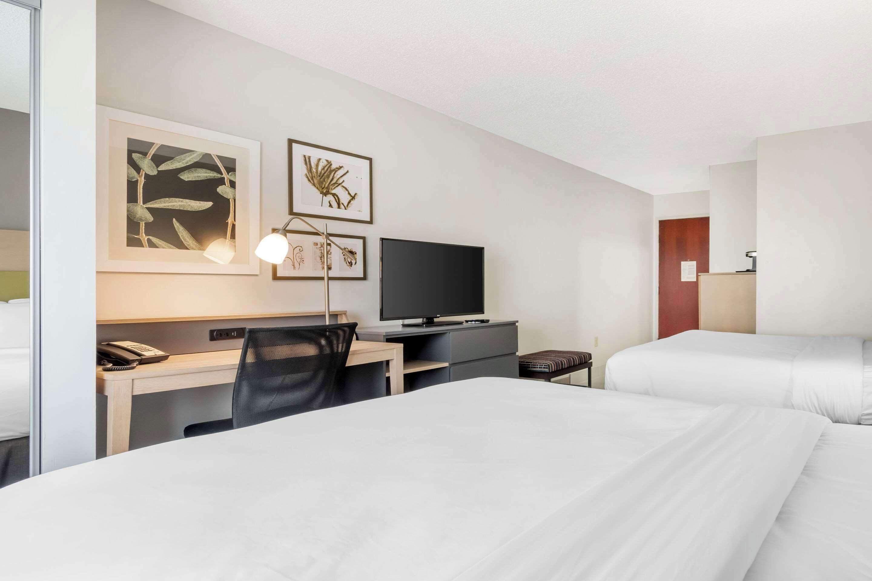 room, 2 queen beds, non smoking | premium bedding, desk, laptop workspace, blackout curtains