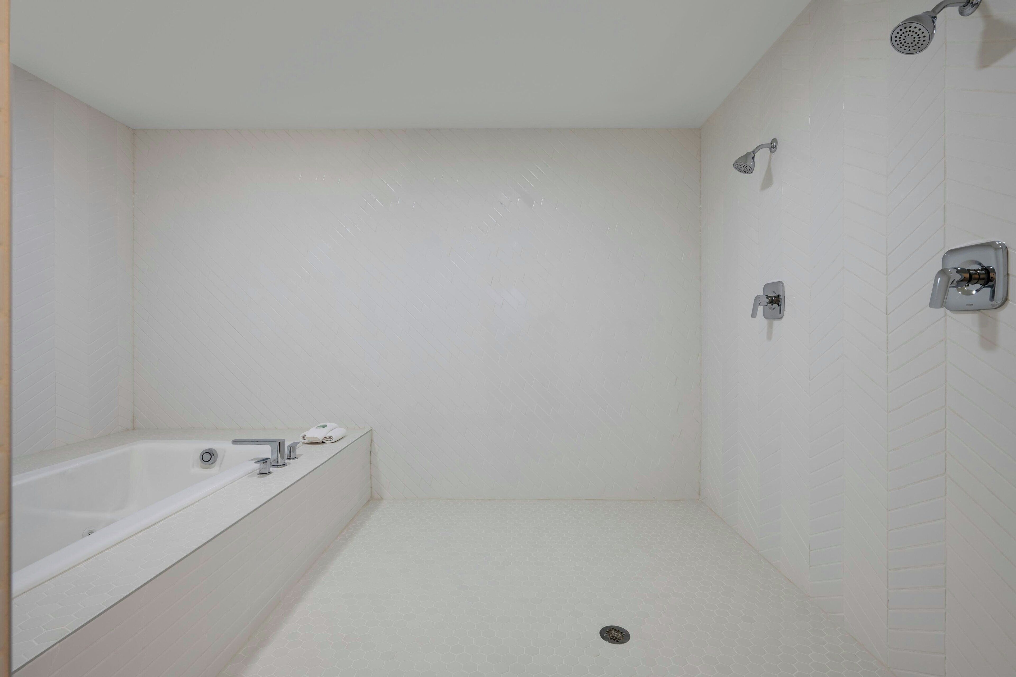 combined shower/bathtub, free toiletries, hair dryer, towels