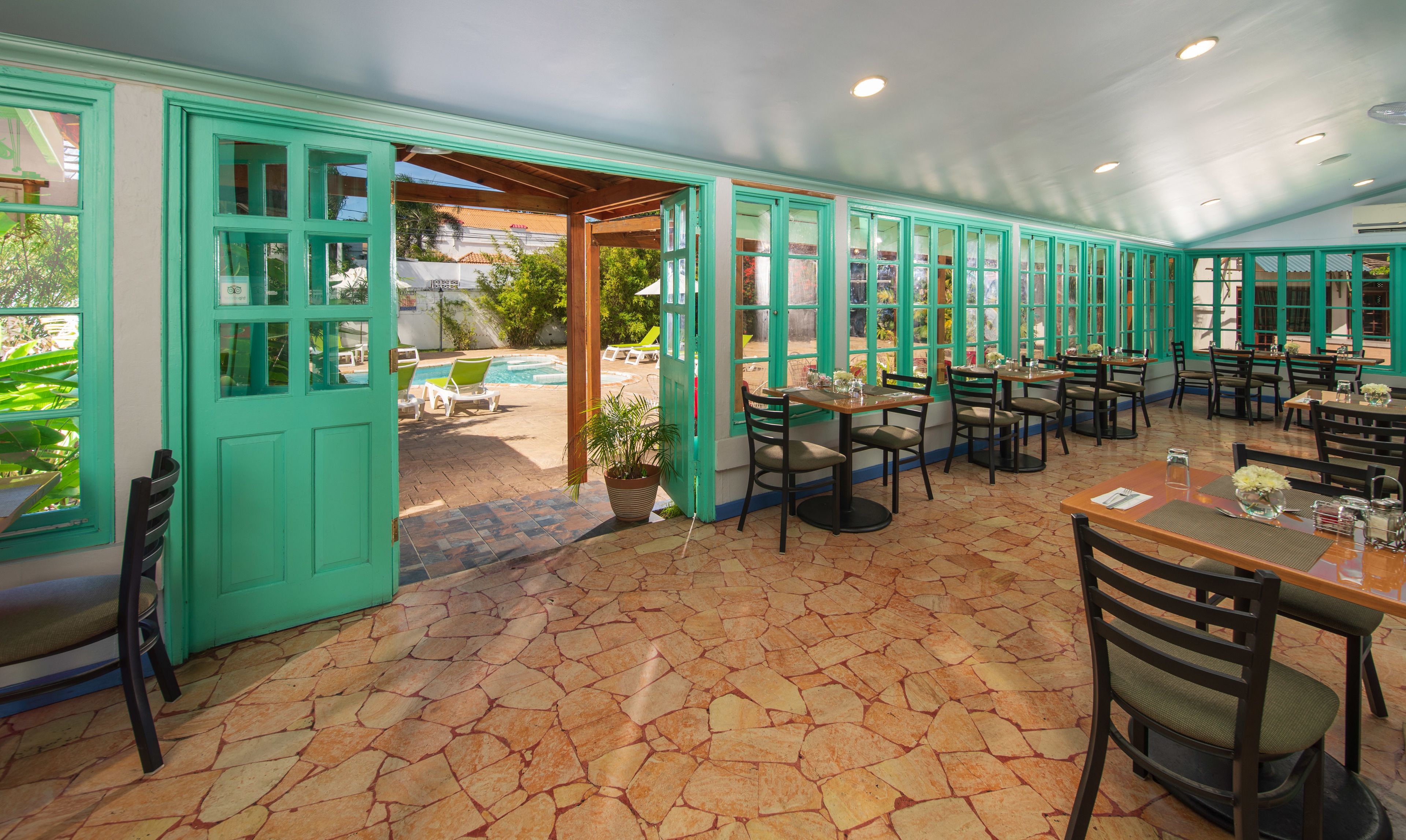 breakfast, lunch served; local and international cuisine, pool views