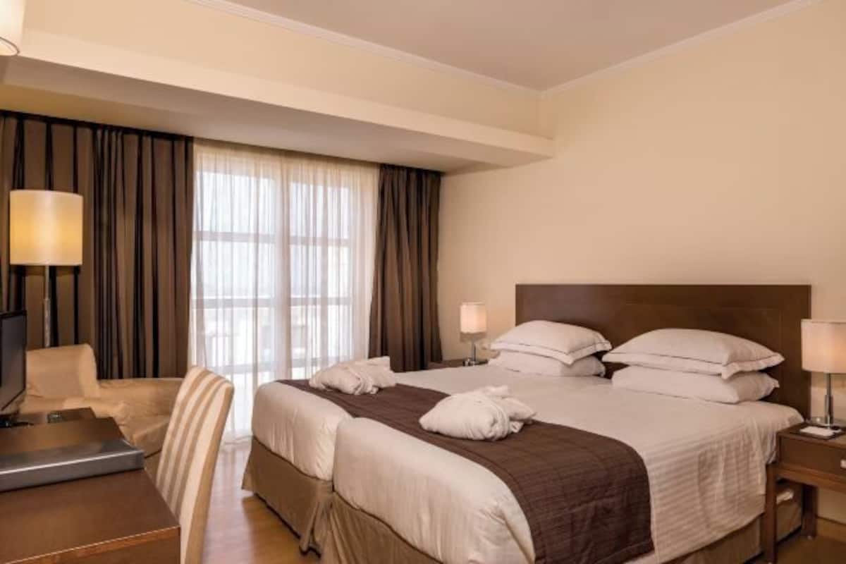 In-room safe, desk, blackout curtains, soundproofing