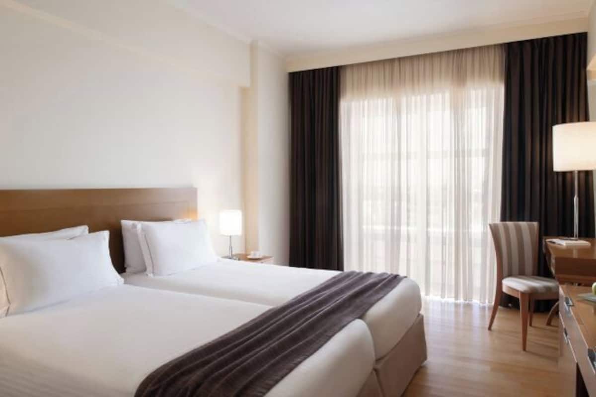 In-room safe, desk, blackout curtains, soundproofing