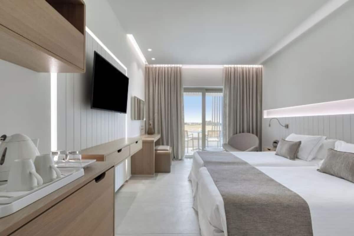 In-room safe, desk, blackout curtains, soundproofing