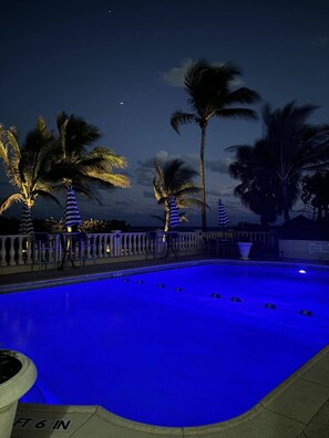 Outdoor pool, open 8:00 AM to 7:00 PM, pool loungers