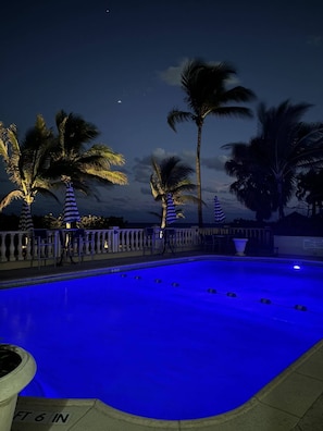 Outdoor pool, open 8:00 AM to 7:00 PM, pool loungers