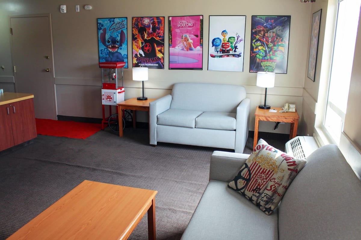 Suite, 1 King Bed, Non Smoking (Movie Suite) | Desk, iron/ironing board, free cots/infant beds, free WiFi