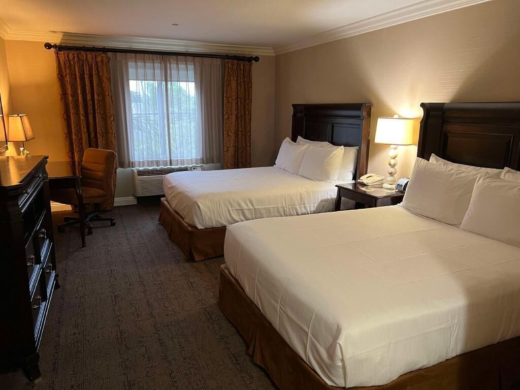 Premium bedding, down comforters, pillowtop beds, desk