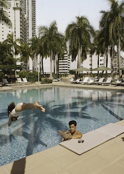 Outdoor pool, cabanas (surcharge), pool umbrellas at Four Seasons Hotel Miami