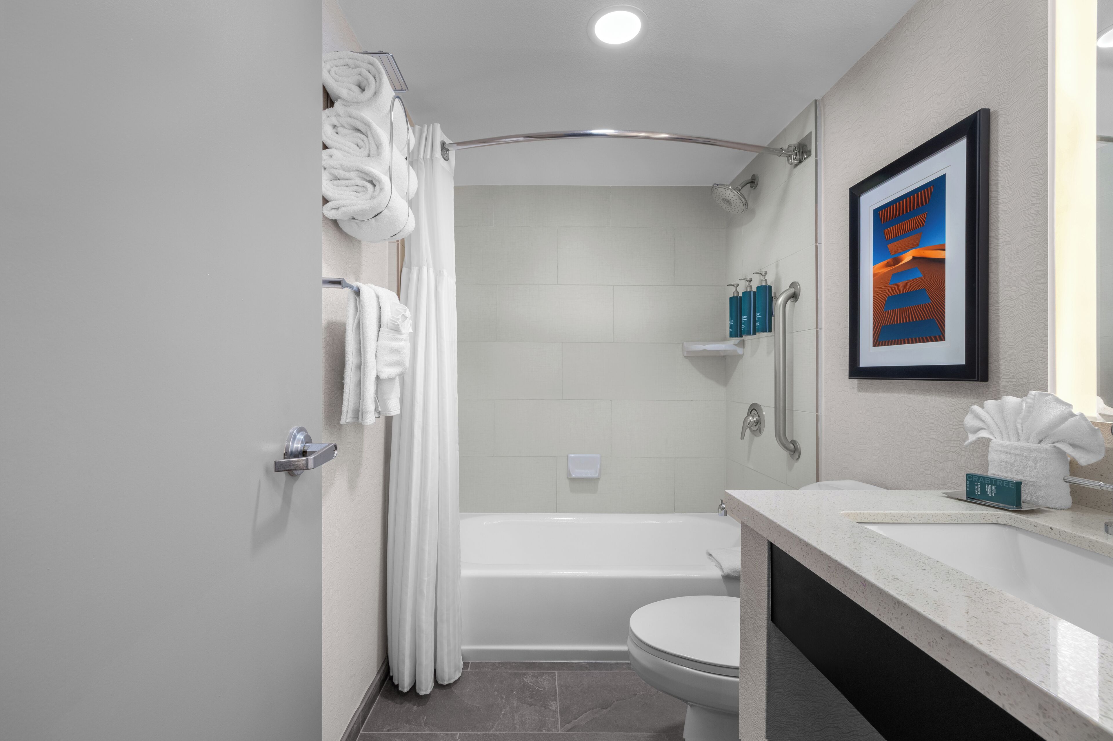 combined shower/bathtub, rainfall showerhead, free toiletries