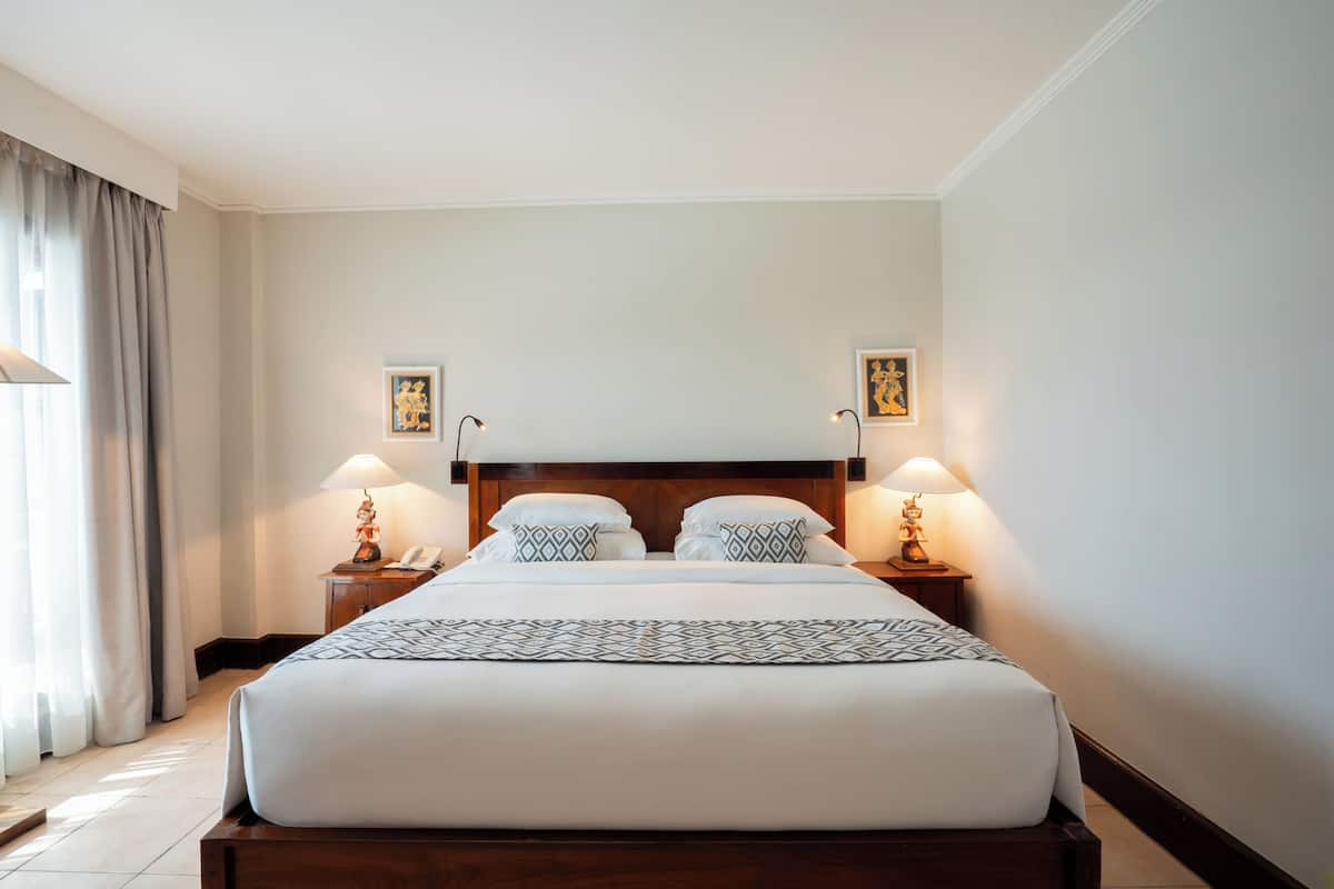 Family Room | Premium bedding, down comforters, minibar, in-room safe