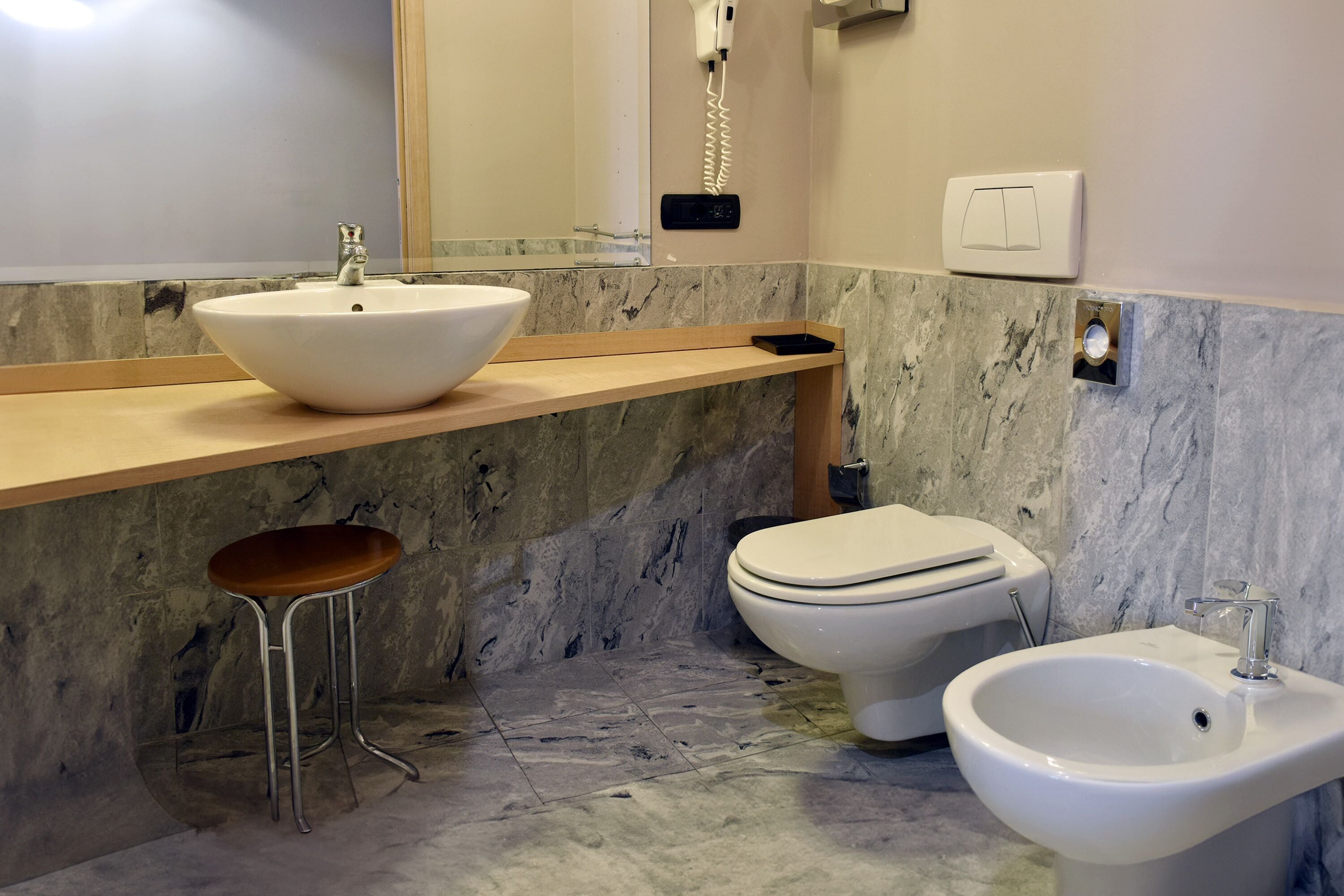 rainfall showerhead, hair dryer, bidet, towels