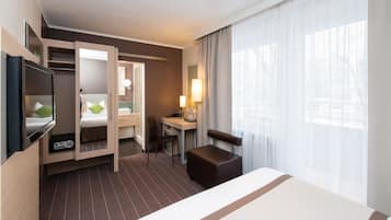 Quarto casal | Frigobar, cofres nos quartos, escrivaninha, cortinas blackout