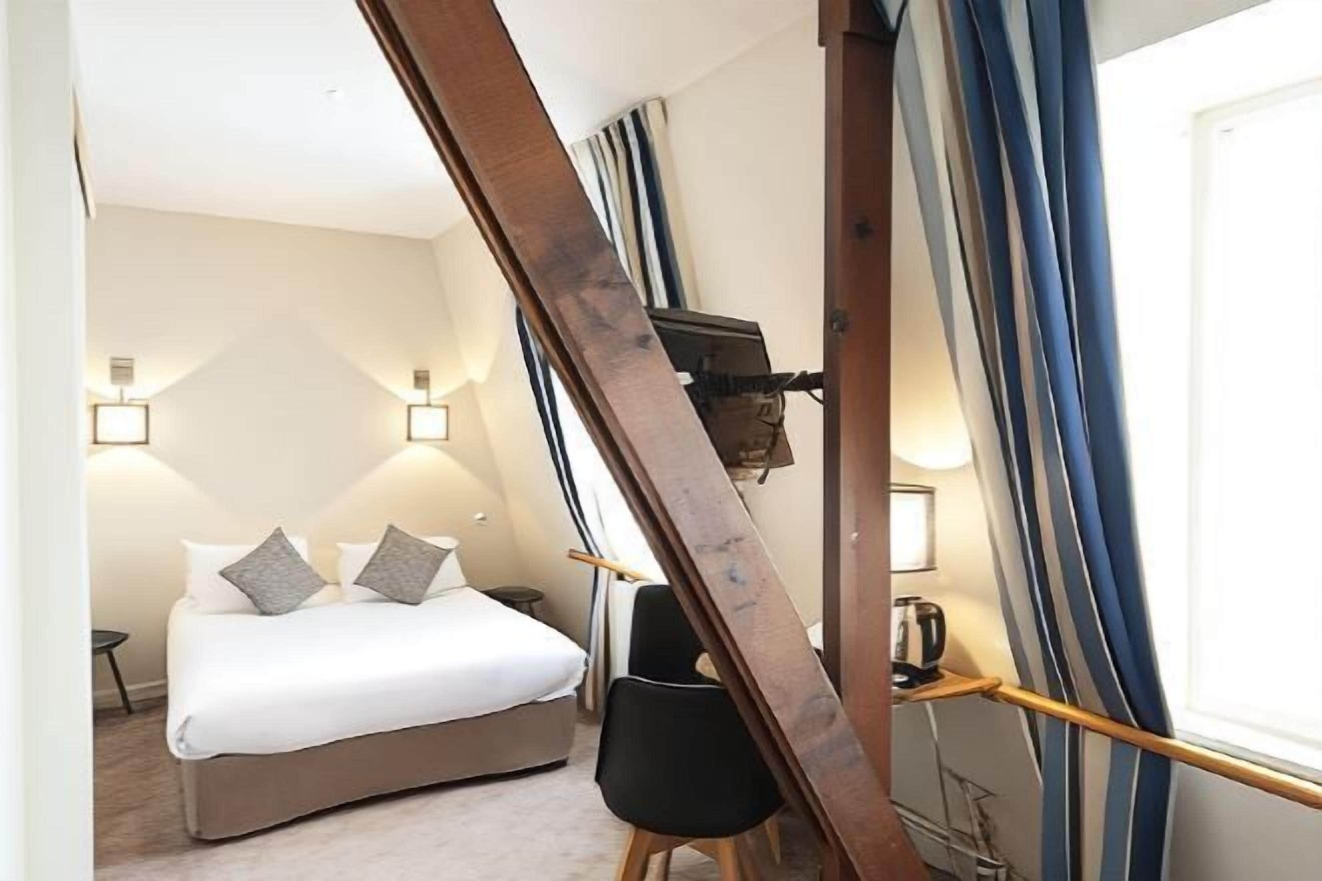 In-room safe, individually furnished, desk, blackout curtains