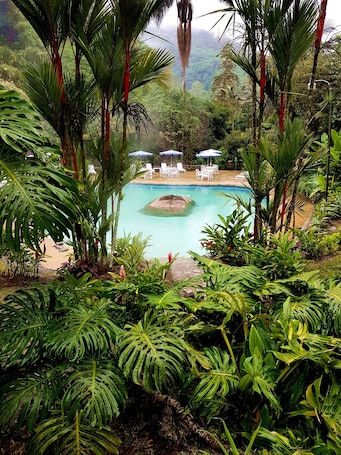2 outdoor pools, pool umbrellas, pool loungers. Rio Perlas Thermal Resort & Spa