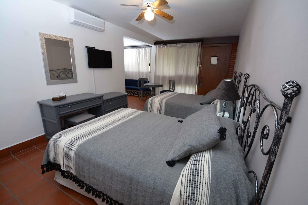 Premium bedding, in-room safe, iron/ironing board (on request)