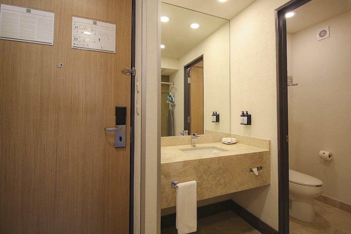 standard room two double beds | bathroom | shower, free toiletries, hair dryer, towels