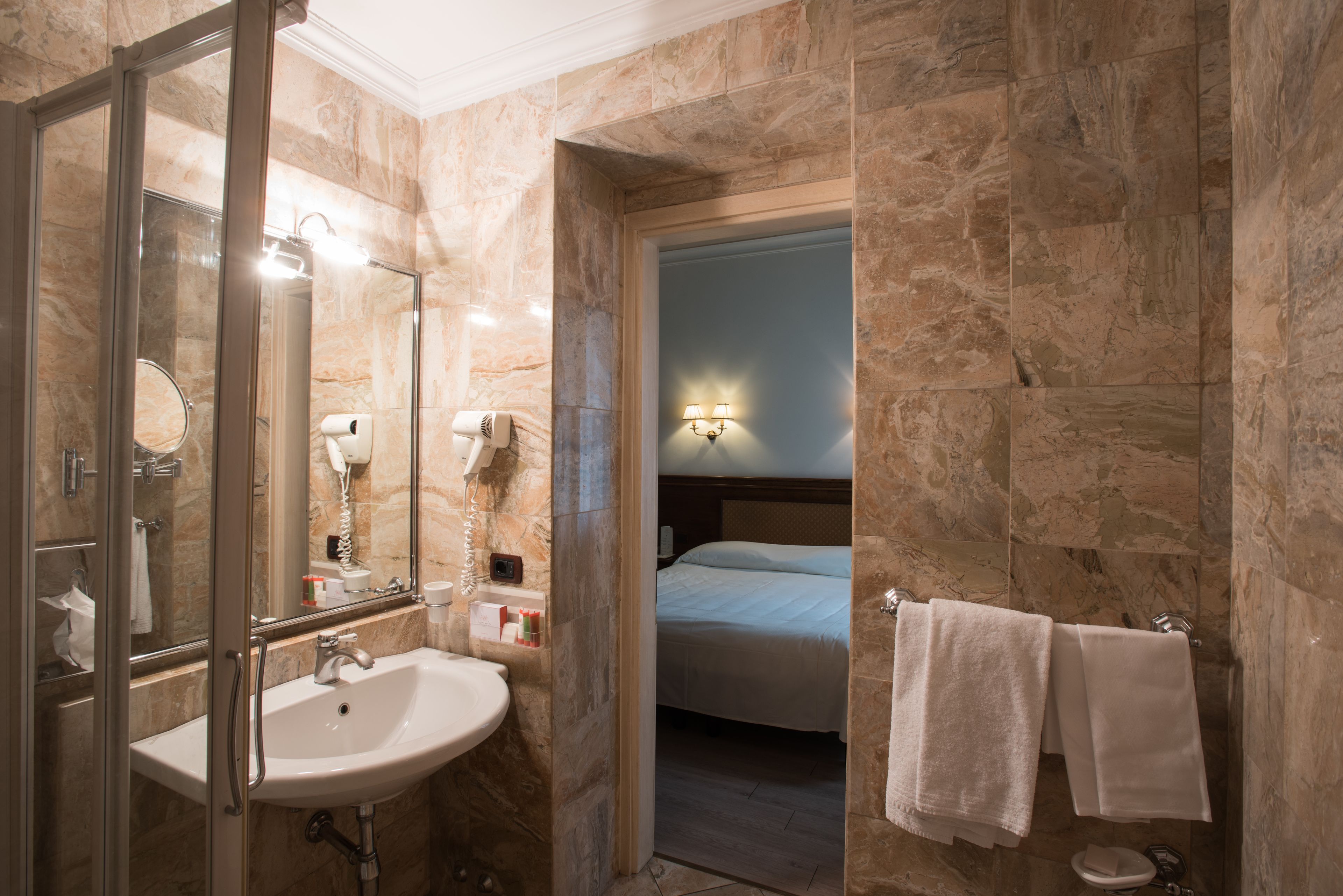 free toiletries, slippers, bidet, towels