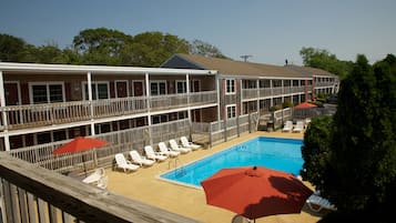 Seasonal outdoor pool, pool umbrellas, pool loungers