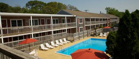 Seasonal outdoor pool, pool umbrellas, pool loungers