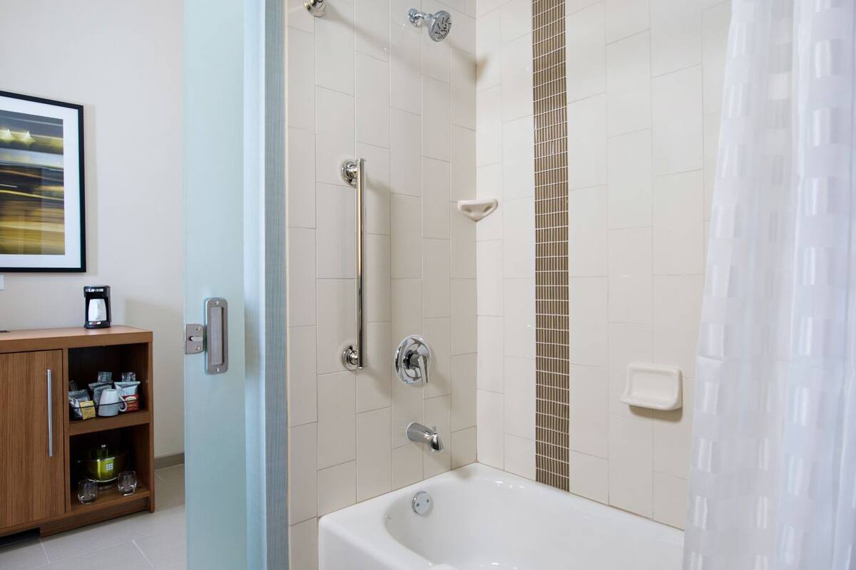 room, 1 king bed (guest) | bathroom | designer toiletries, hair dryer, towels