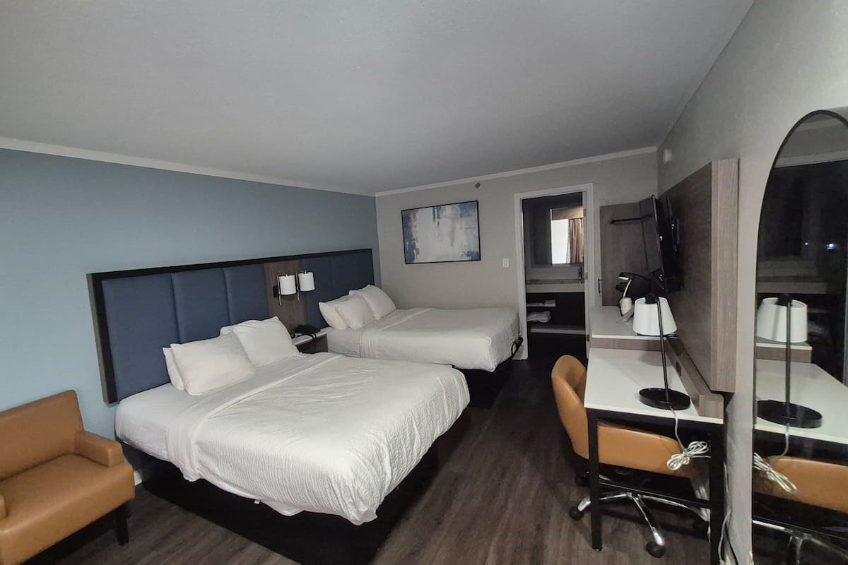 Room, 2 Queen Beds, Non Smoking | Desk, laptop workspace, blackout drapes, iron/ironing board