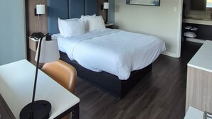 Room, 1 King Bed, Hearing Accessible, Non Smoking (Mobility, Bathtub w/ Grab Bars) | Desk, laptop workspace, blackout drapes, iron/ironing board - Baymont by Wyndham Pawleys Island (Pawleys Island)