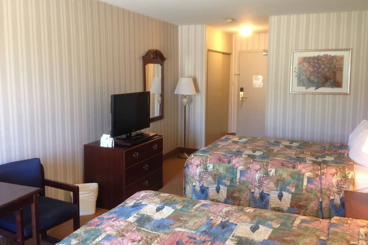 Desk, soundproofing, iron/ironing board, rollaway beds