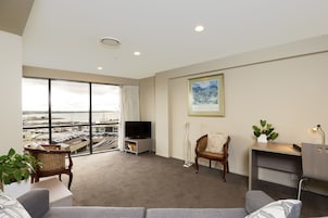One Bedroom Apartment Harbour View | Living area | 43-inch flat-screen TV with cable channels, TV