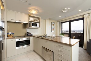 Standard Apartment, 1 Bedroom, Harbor View | Private kitchen | Fridge, microwave, stovetop, coffee/tea maker