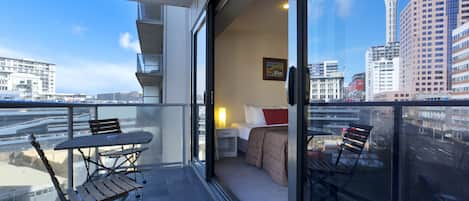 Standard Studio Suite, 1 Queen Bed, City View | Balcony