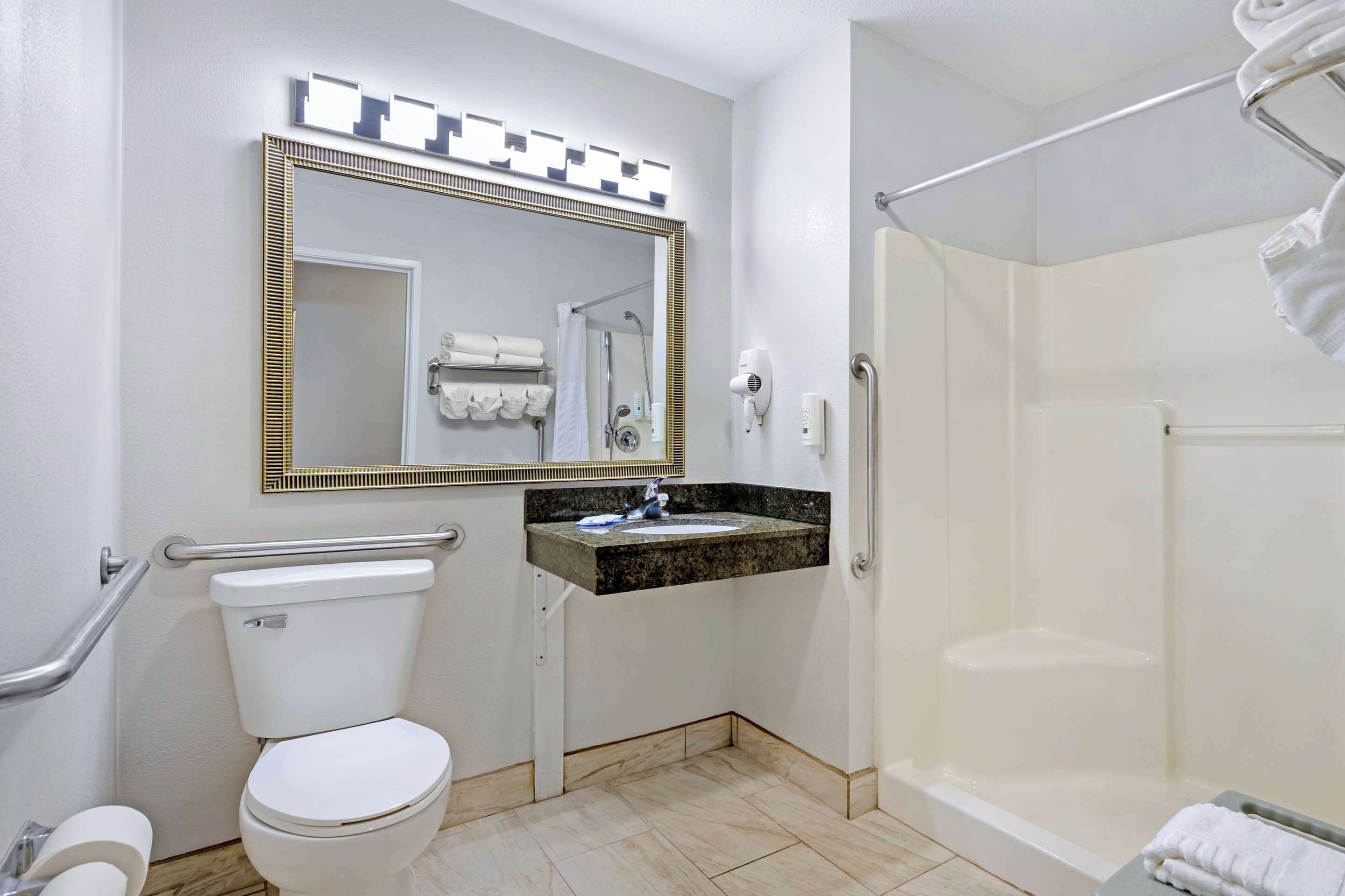 premium bedding, desk, laptop workspace, iron/ironing board