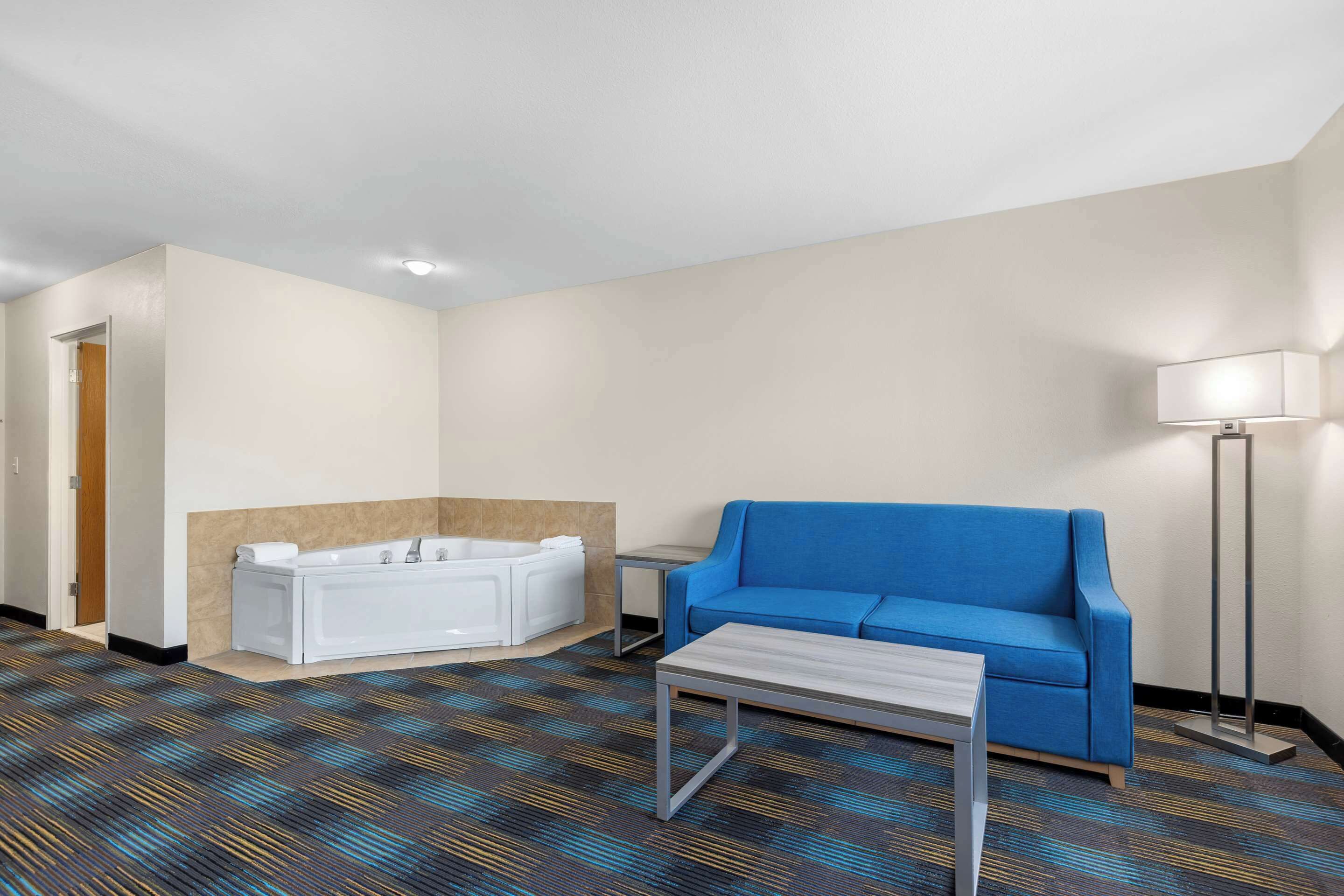 suite, 1 king bed, non smoking | premium bedding, desk, laptop workspace, iron/ironing board