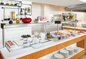 Breakfast, lunch, dinner served; local cuisine, pool views 