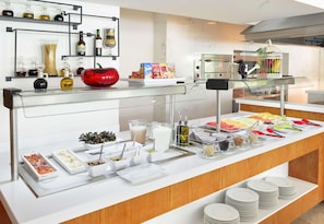Breakfast, lunch, dinner served; local cuisine, pool views