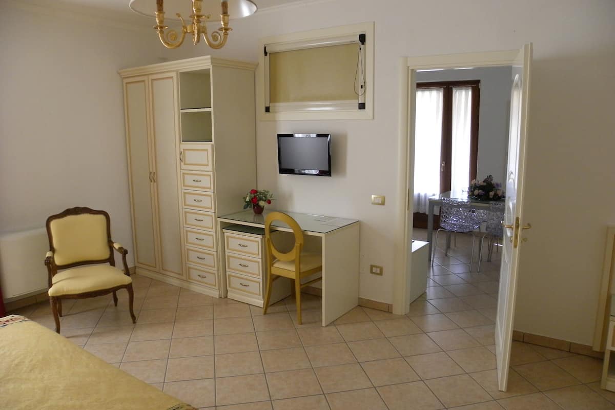 quadruple suite, terrace, sea view | 1 bedroom, minibar, in-room safe, desk