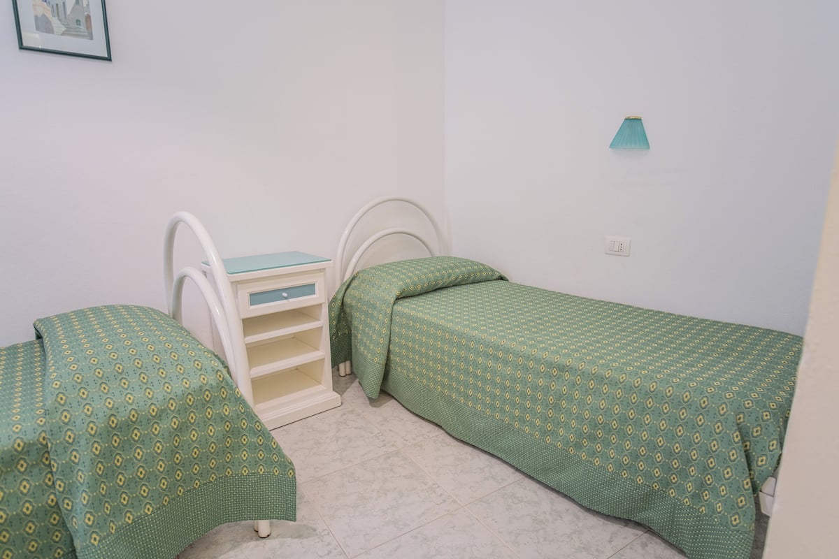 Standard Quadruple Room | 1 bedroom, minibar, in-room safe, desk