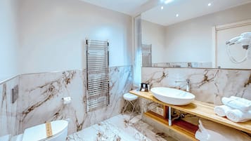 Shower, free toiletries, hair dryer, towels