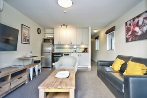 Apartment, 2 Bedrooms, Kitchen | Living area | Flat-screen TV, DVD player