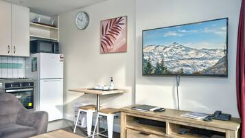 Superior 1 Bedroom Apartment, Kitchen | Living area | Flat-screen TV, DVD player
