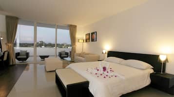 Luxury Suite, Balcony | In-room safe, desk, laptop workspace, blackout curtains