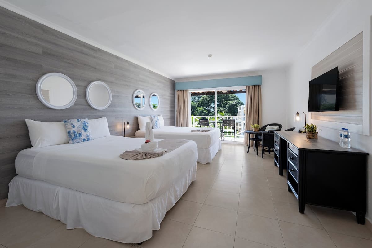 Deluxe Double Room, Garden View (No access to the saltwater pool) | 1 bedroom, in-room safe, desk, laptop workspace