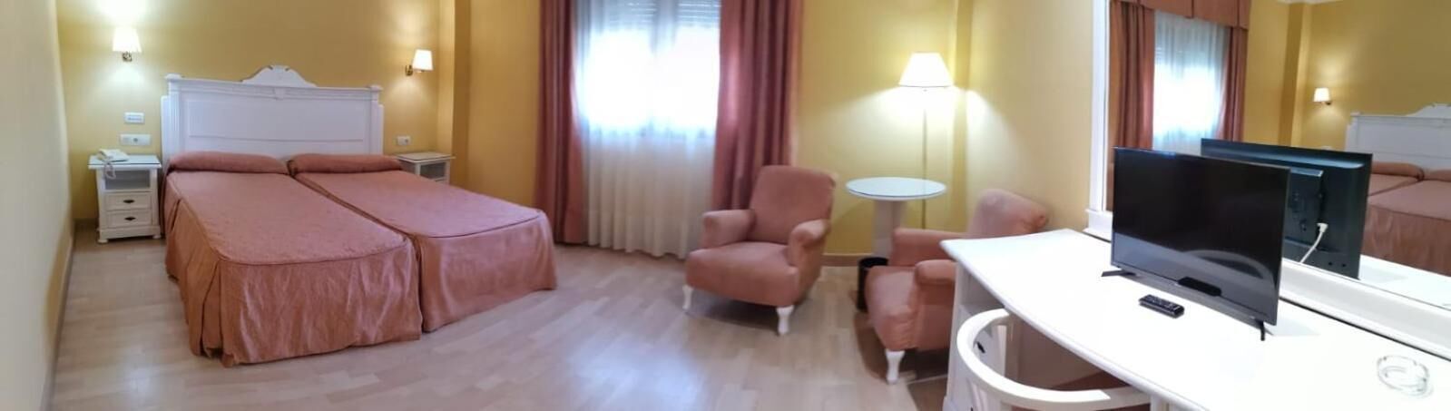 minibar, desk, laptop workspace, blackout curtains