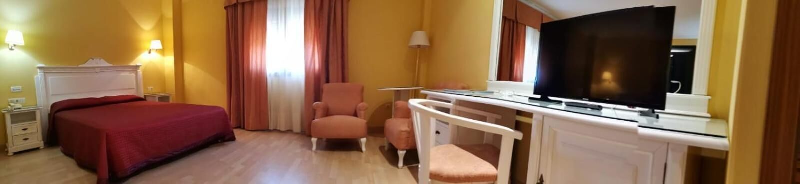 minibar, desk, laptop workspace, blackout curtains