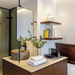 Cozy Luxe Room | Bathroom | Free toiletries, hair dryer, slippers, towels