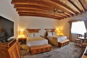 Suite | Down comforters, in-room safe, individually decorated