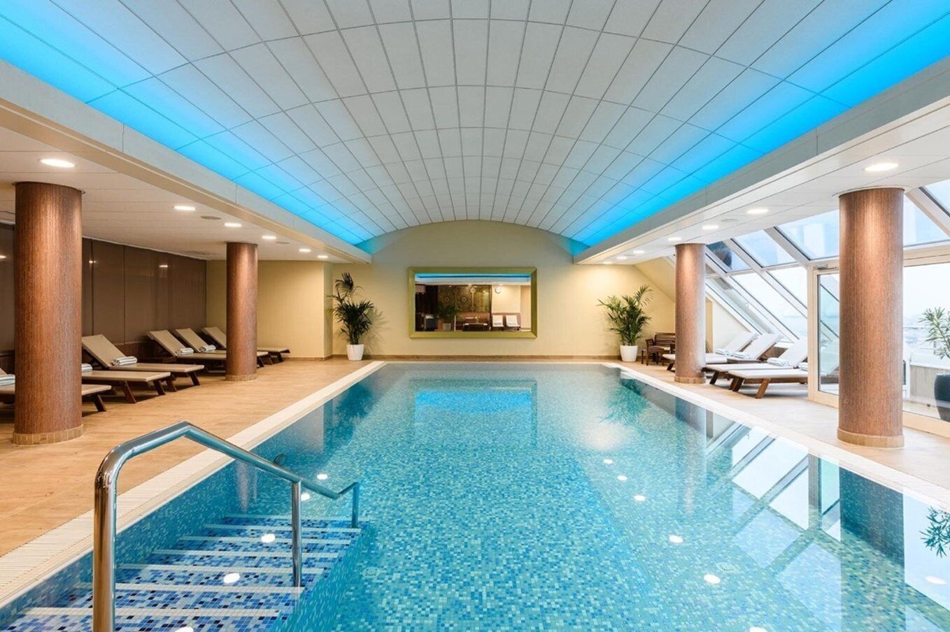 indoor pool, open 9:00 am to 9:00 pm, pool loungers