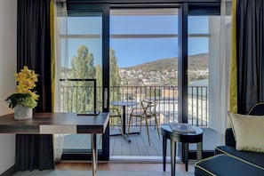 Executive Double Room, Balcony, City View | Minibar, in-room safe, desk, soundproofing