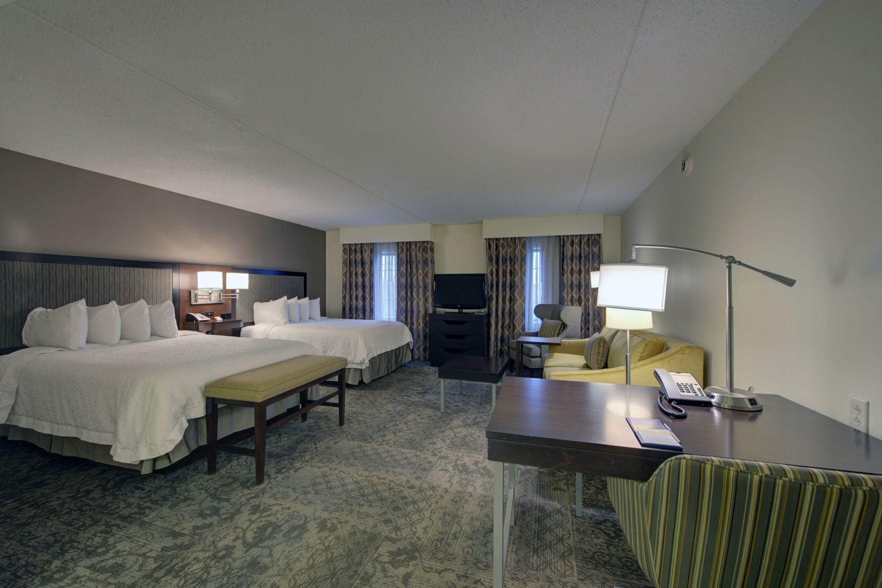 Premium bedding, desk, iron/ironing board, rollaway beds