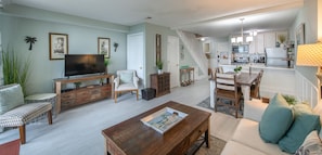 Villa, 2 Bedrooms (Oceanside) | Living room | 42-inch flat-screen TV with satellite channels, TV, books