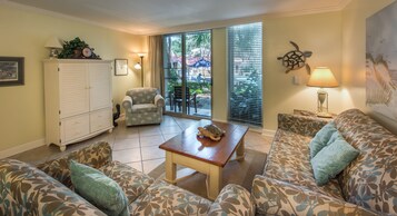 Villa, 2 Bedrooms | Living area | 42-inch flat-screen TV with satellite channels, TV, books