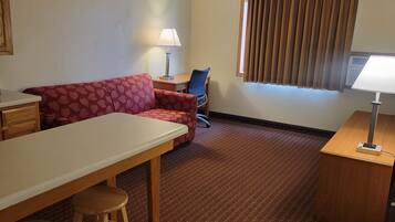 Studio Suite, 1 King Bed, Non Smoking, Jetted Tub | Individually decorated, individually furnished, desk, iron/ironing board